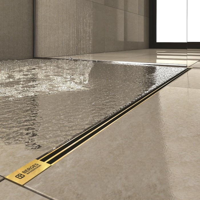 Душевой лоток BERGES напольный SUPER Slim 700 нержавеющая сталь, решетка золото глянец, S-сифон D50/110, арт.092053